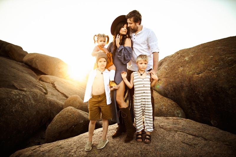 Oklahoma Family Photographer, family standing together on top of a rock